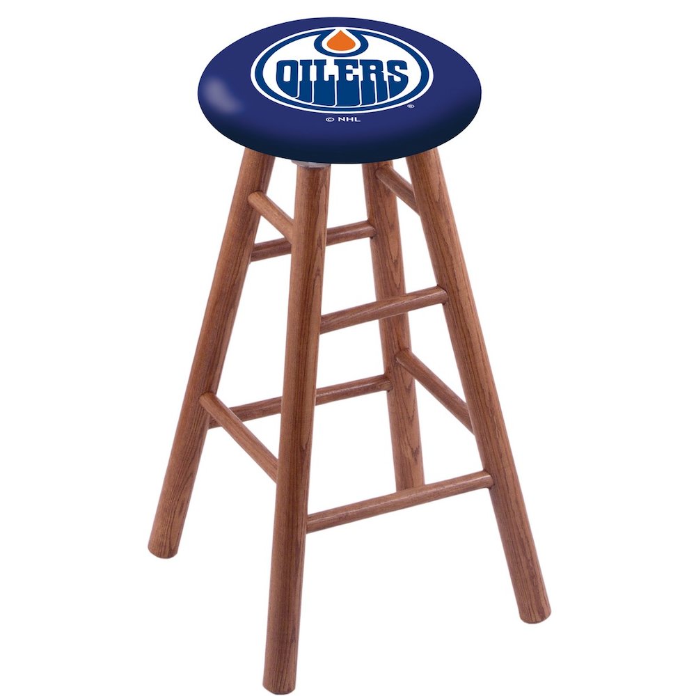 Oak Extra Tall Bar Stool in Medium Finish with Edmonton Oilers Seat. The main picture.