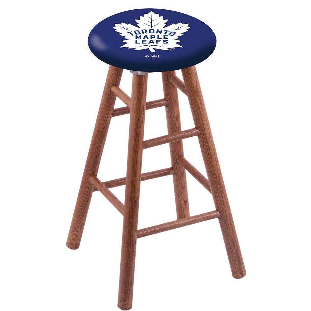 Oak Bar Stool in Medium Finish with Toronto Maple Leafs Seat. The main picture.