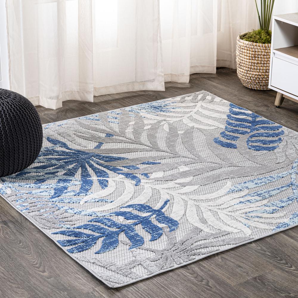Tropics Palm Leaves Indoor/Outdoor Area Rug. Picture 11