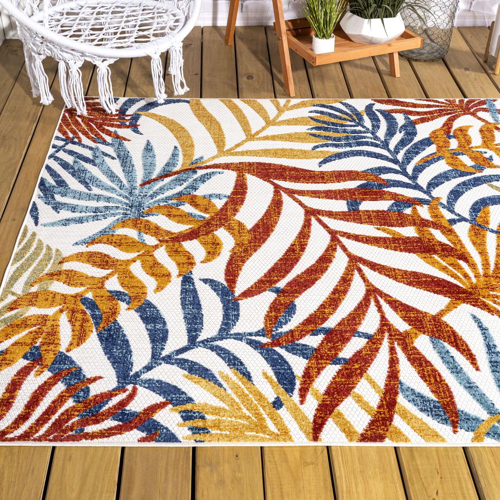 Tropics Palm Leaves Indoor/Outdoor Area Rug. Picture 9