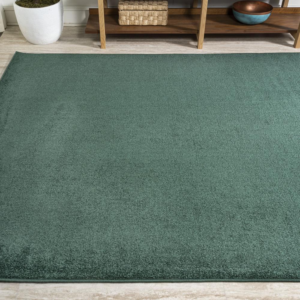 Haze Solid Low Pile Area Rug Emerald. Picture 4