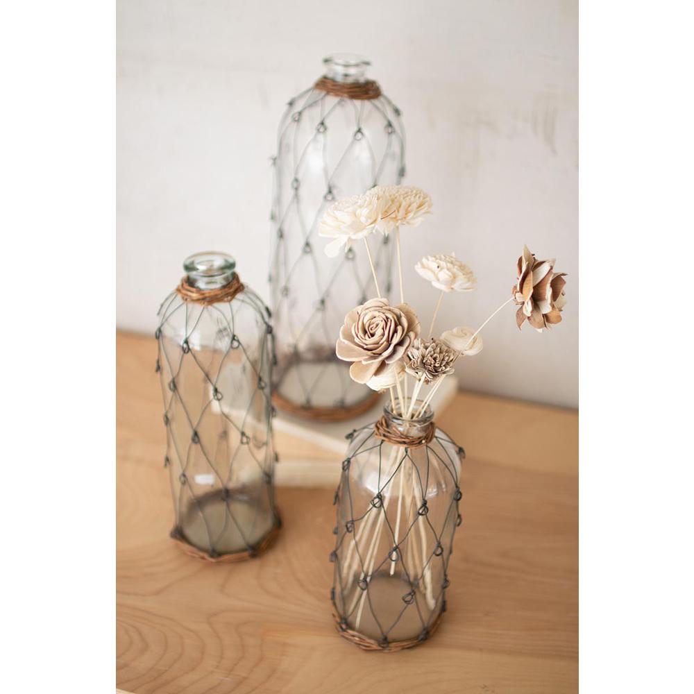 Set Of Three Tall Wire And Wicker Wrapped Glass Bottles. Picture 2