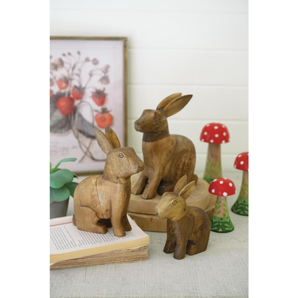 Set Of Three Carved Wooden Rabbits. Picture 2