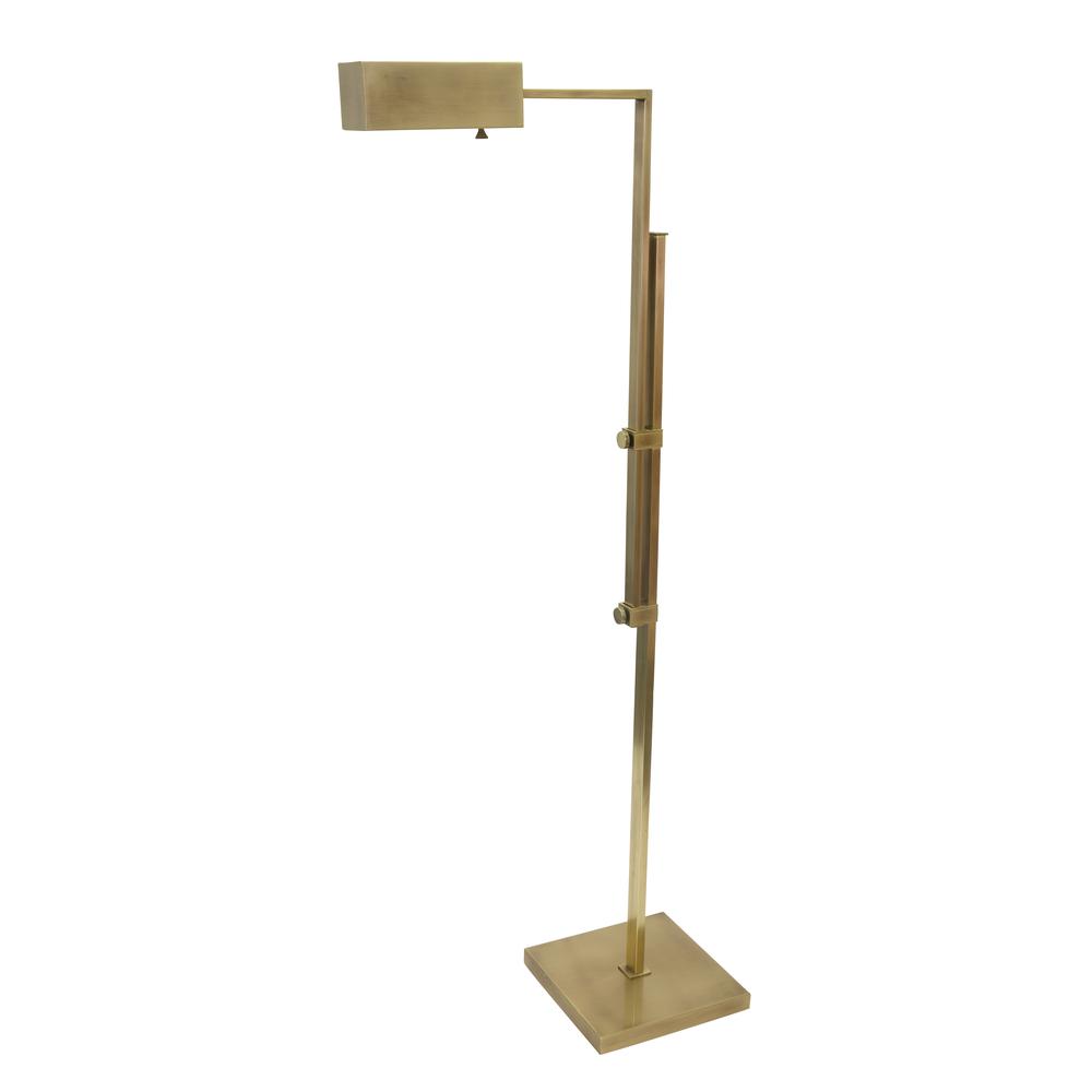 Andover Adjustable Floor Lamp in Antique Brass. Picture 1