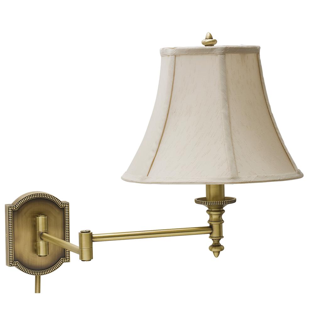 Wall Swing Arm Lamp in Antique Brass. Picture 1