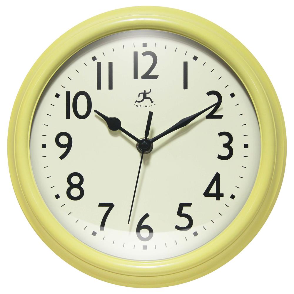 Nostalgic 9.5" Plastic Clock - Yellow. Picture 1