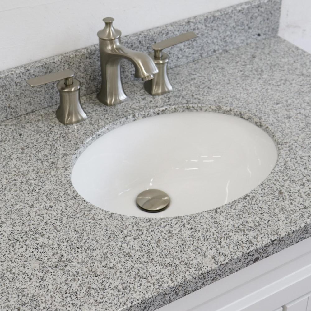 Single sink vanity in White with Gray granite and Left door/Center sink. Picture 11