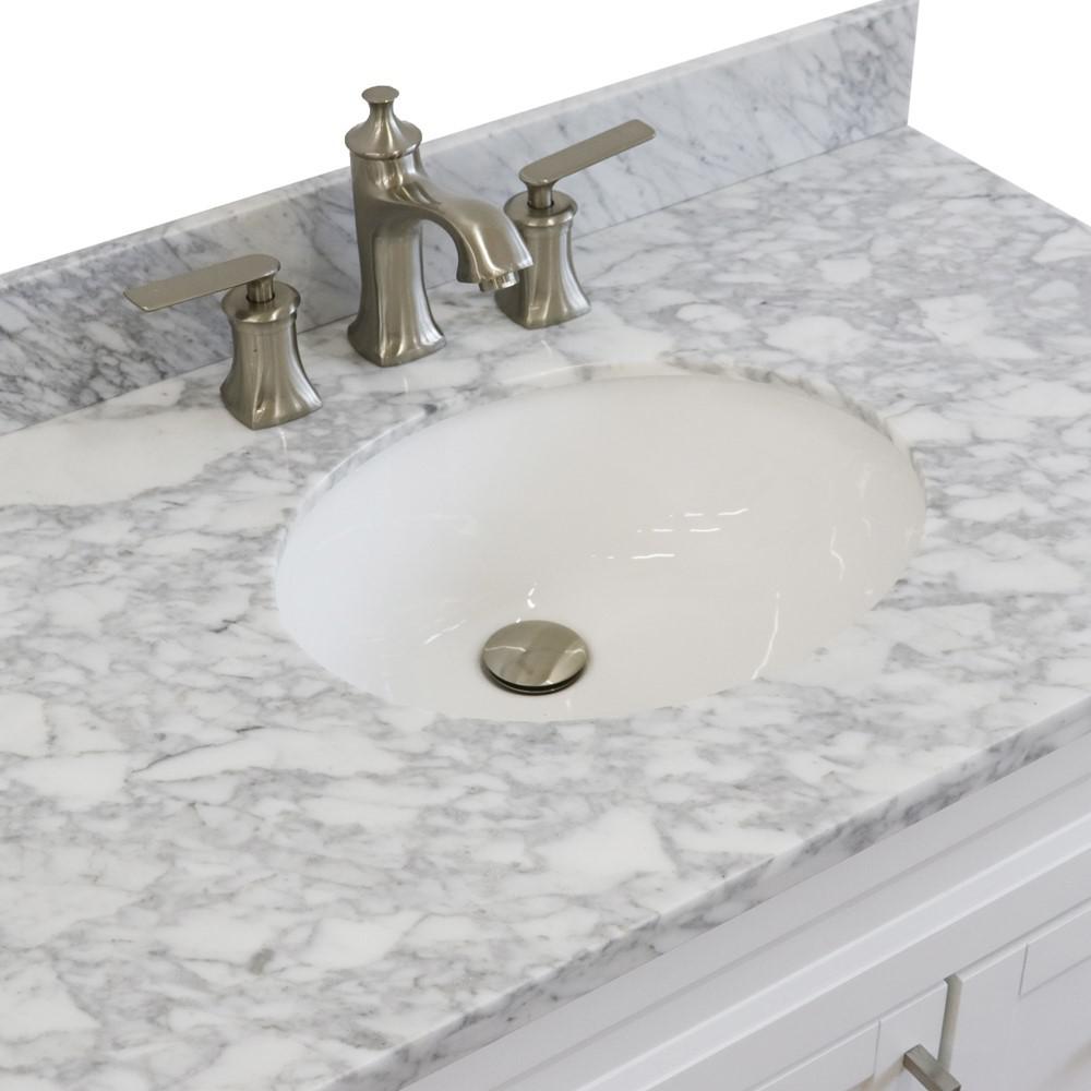 Single sink vanity in White with White Carrara marble and door/sink. Picture 8