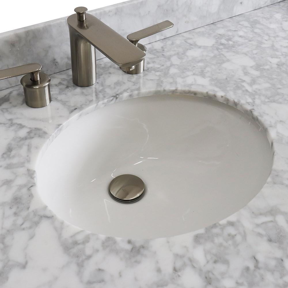 Double sink vanity in Dark Gray and White Carrara marble and oval sink. Picture 10
