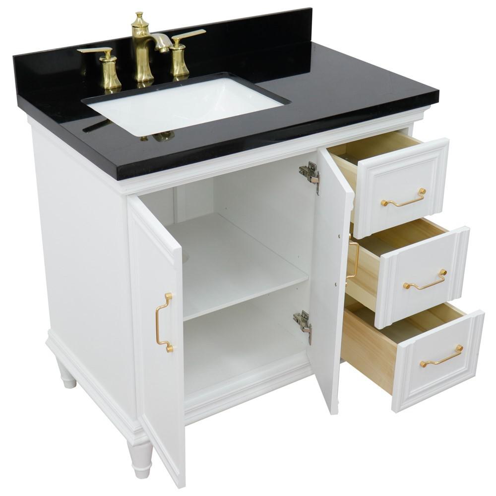 Single vanity in White with Black galaxy and rectangle sink- door/sink. Picture 13