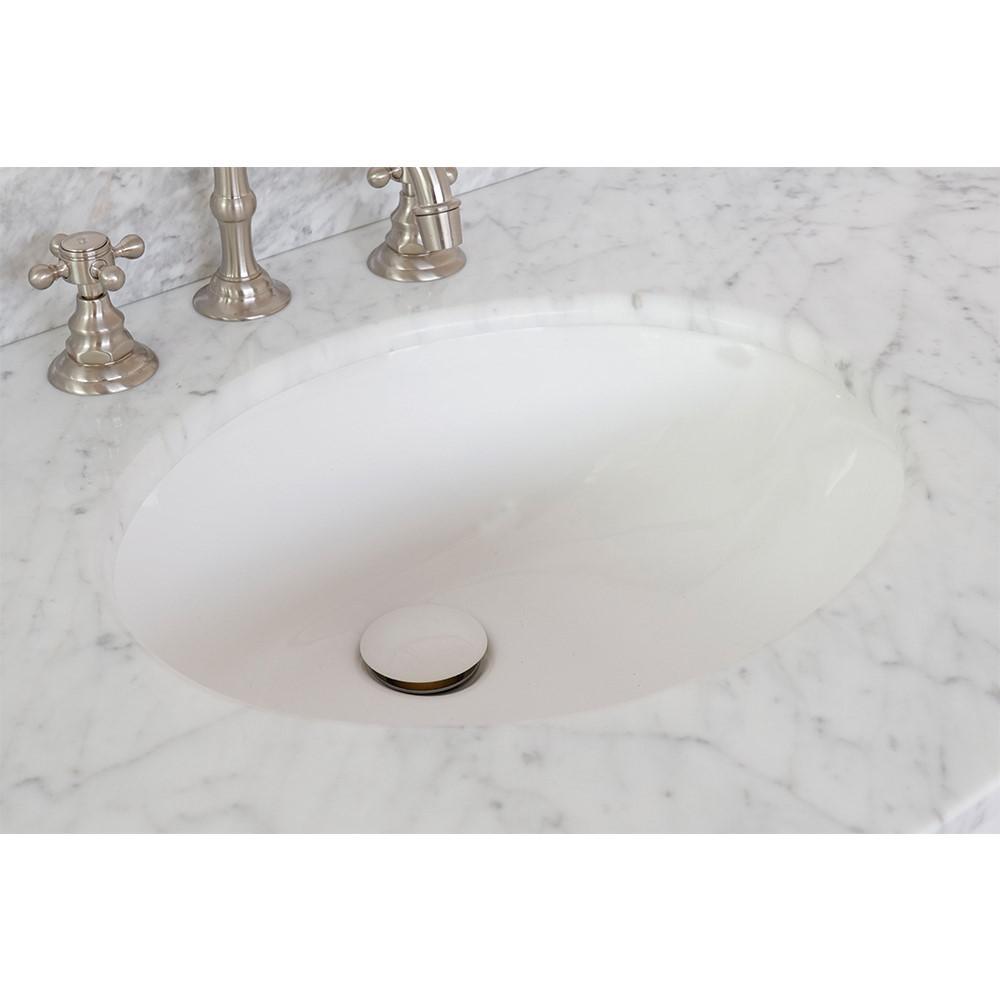 31 White Carrara marble top with oval sink. Picture 1
