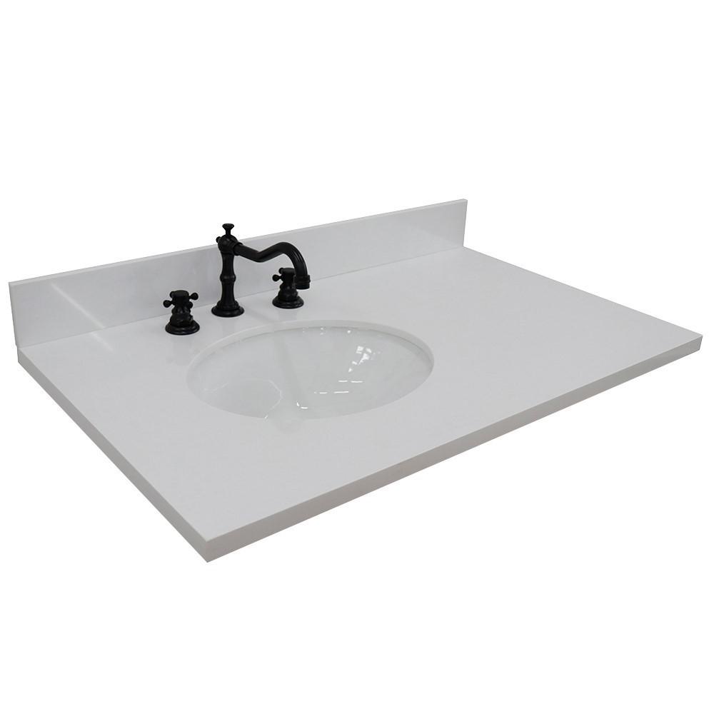 37 White quartz countertop and single oval left sink. Picture 2