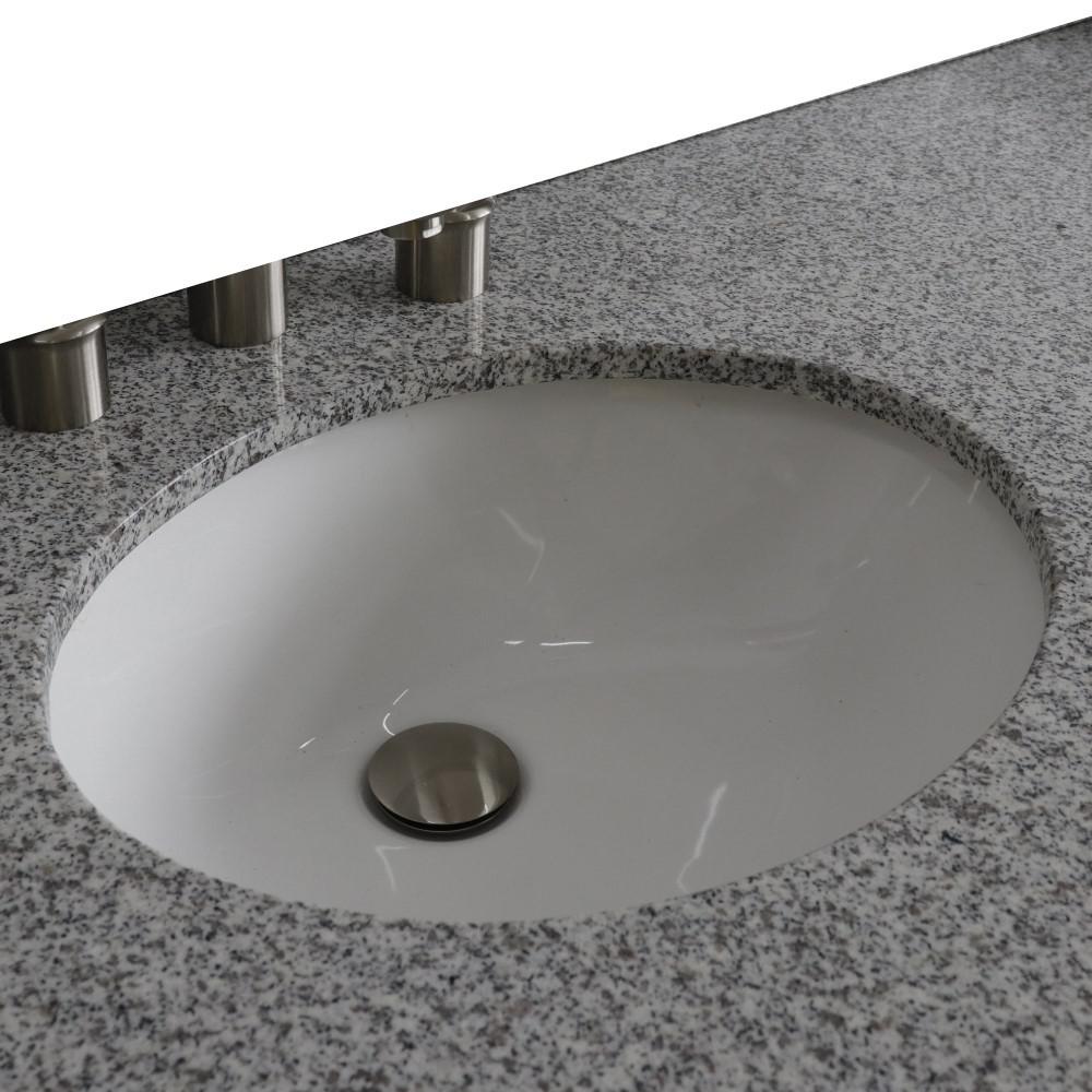 61 Gray granite countertop and double oval sink. Picture 3