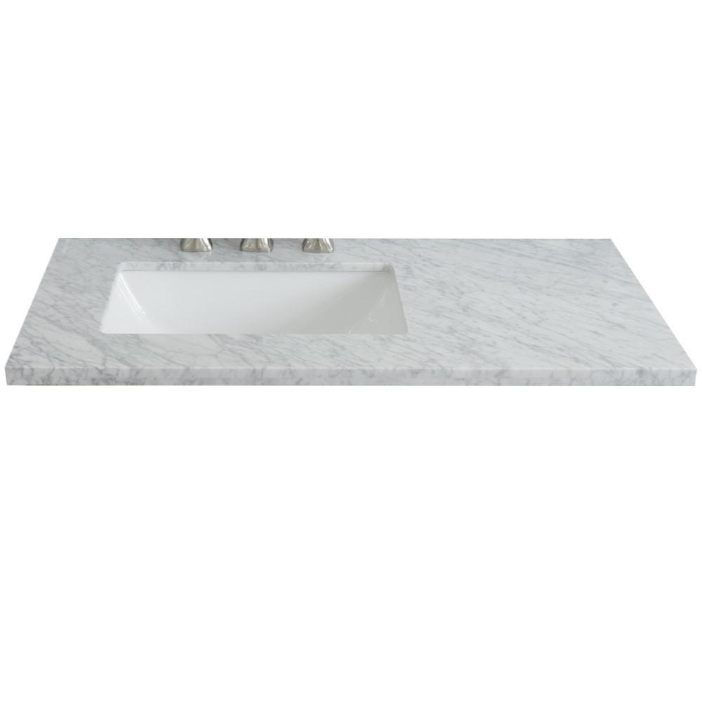37 White Carrara countertop and single rectangle left sink. Picture 1
