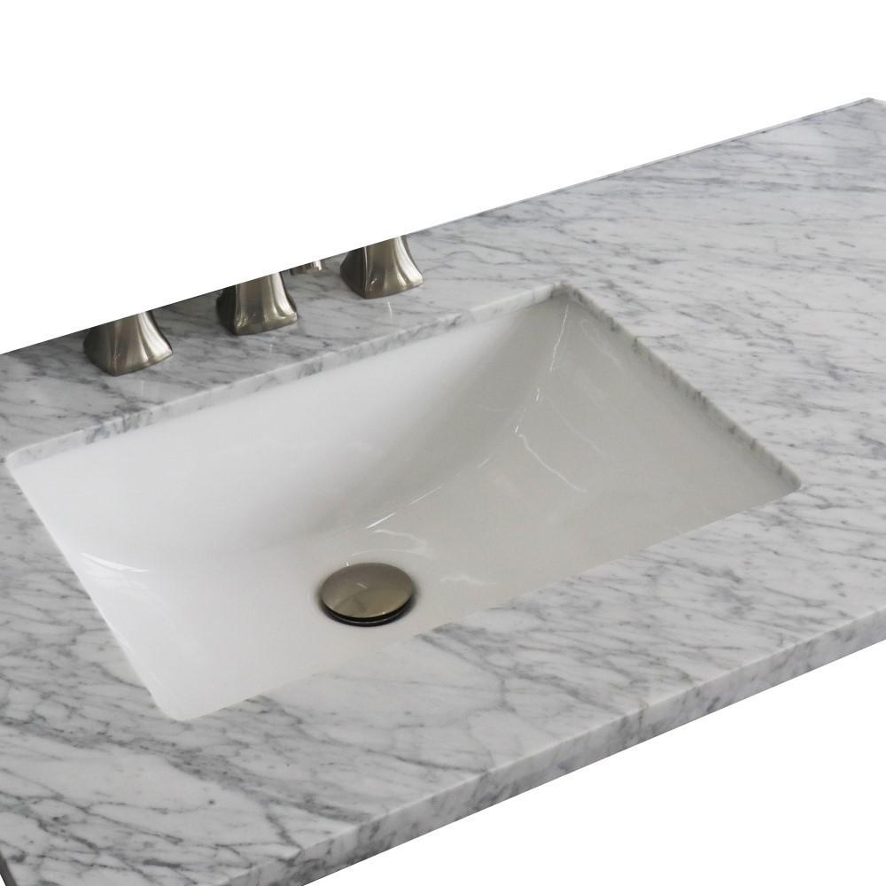 37 White Carrara countertop and single rectangle left sink. Picture 3