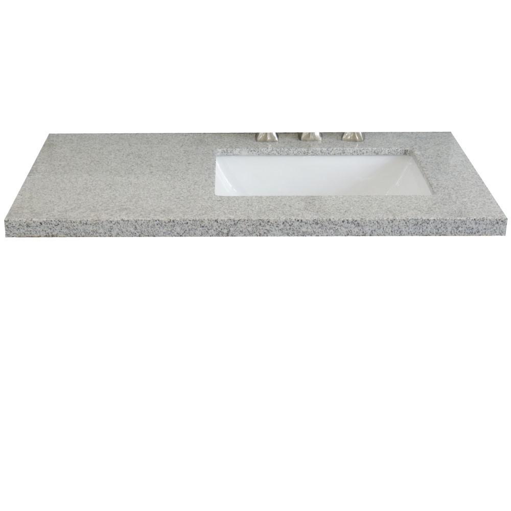 37 Gray granite countertop and single rectangle right sink. Picture 1