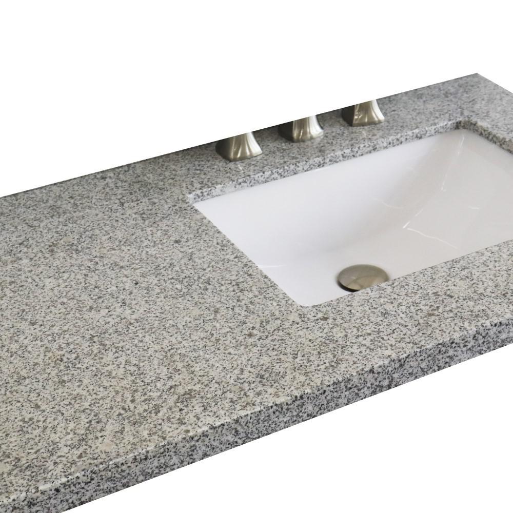 37 Gray granite countertop and single rectangle right sink. Picture 3