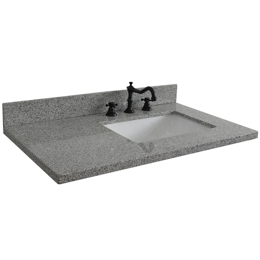 37 Gray granite countertop and single rectangle right sink. Picture 5
