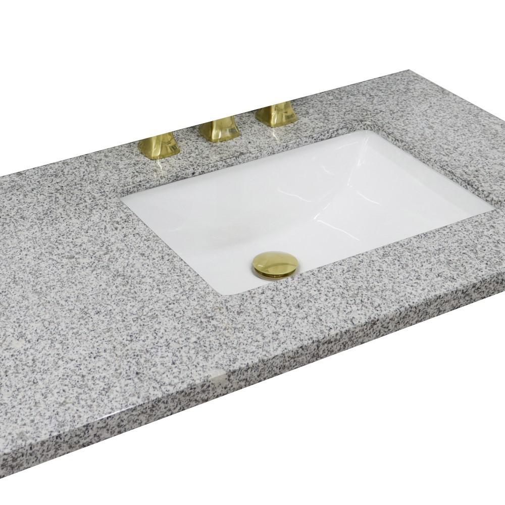 43 Gray granite countertop and single rectangle right sink. Picture 3