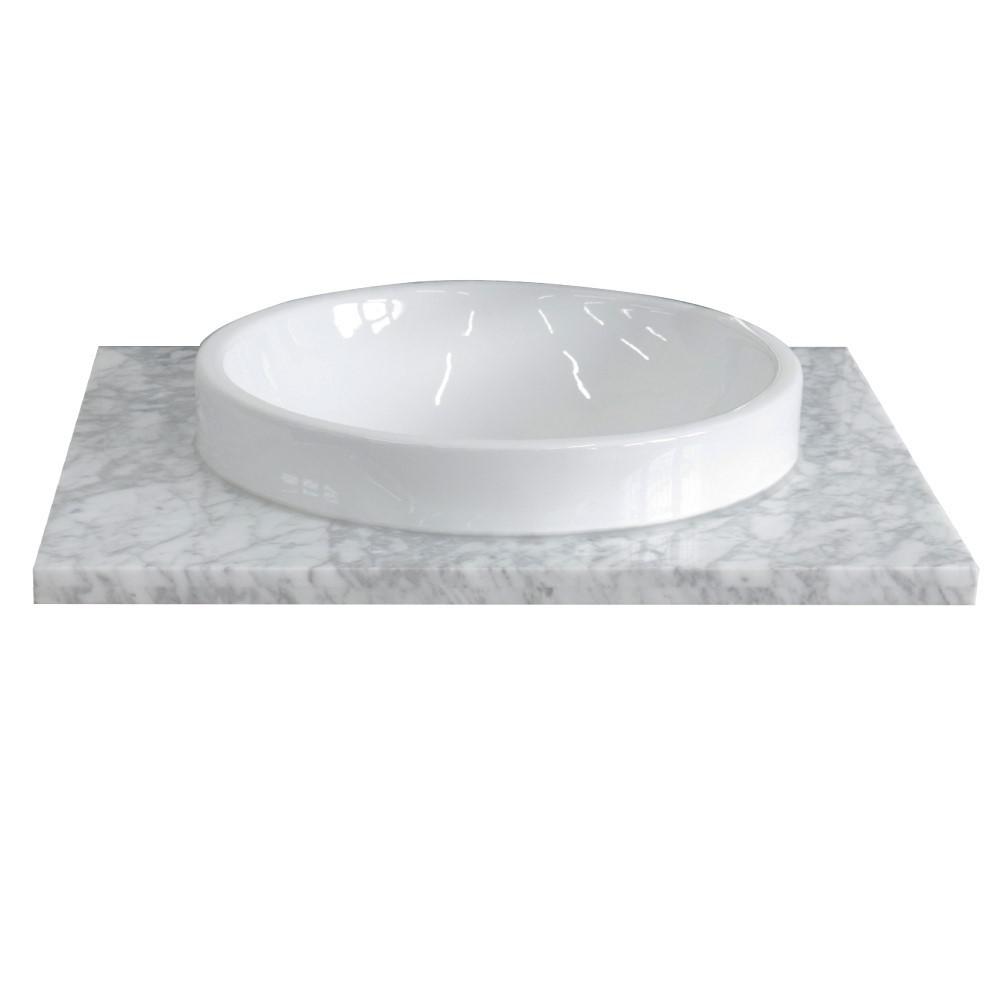 25 White Carrara countertop and single round sink. Picture 3