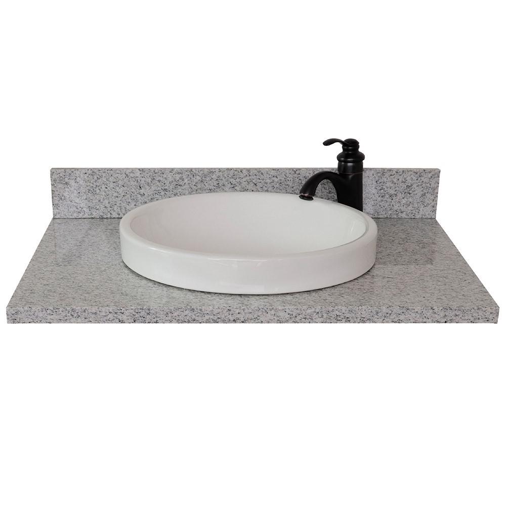 31 Gray granite top with round sink. Picture 4