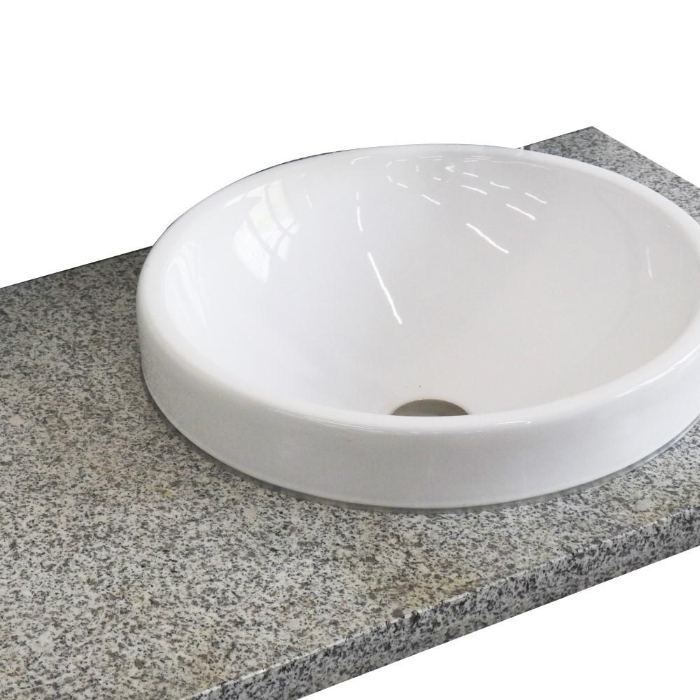 37 Gray granite countertop and single round right sink. Picture 2