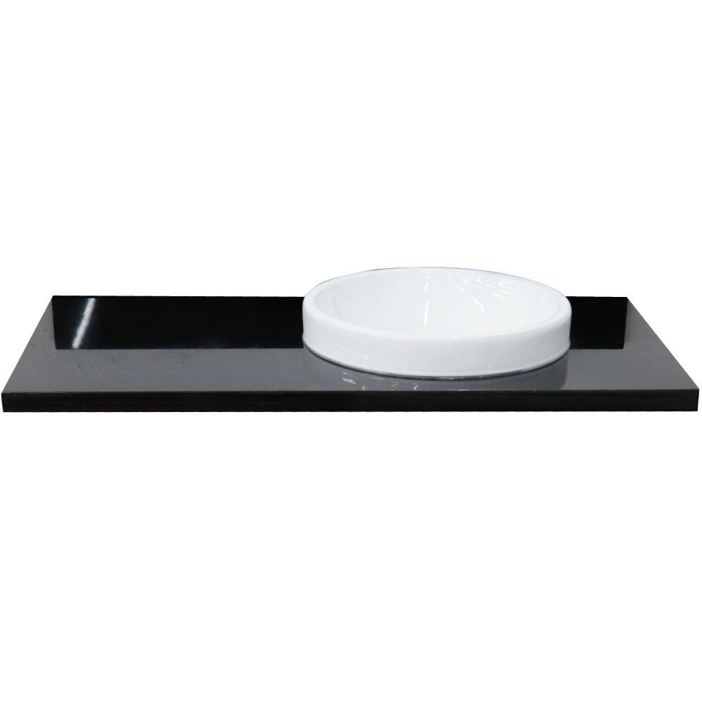 43 Black galaxy countertop and single round right sink. Picture 1