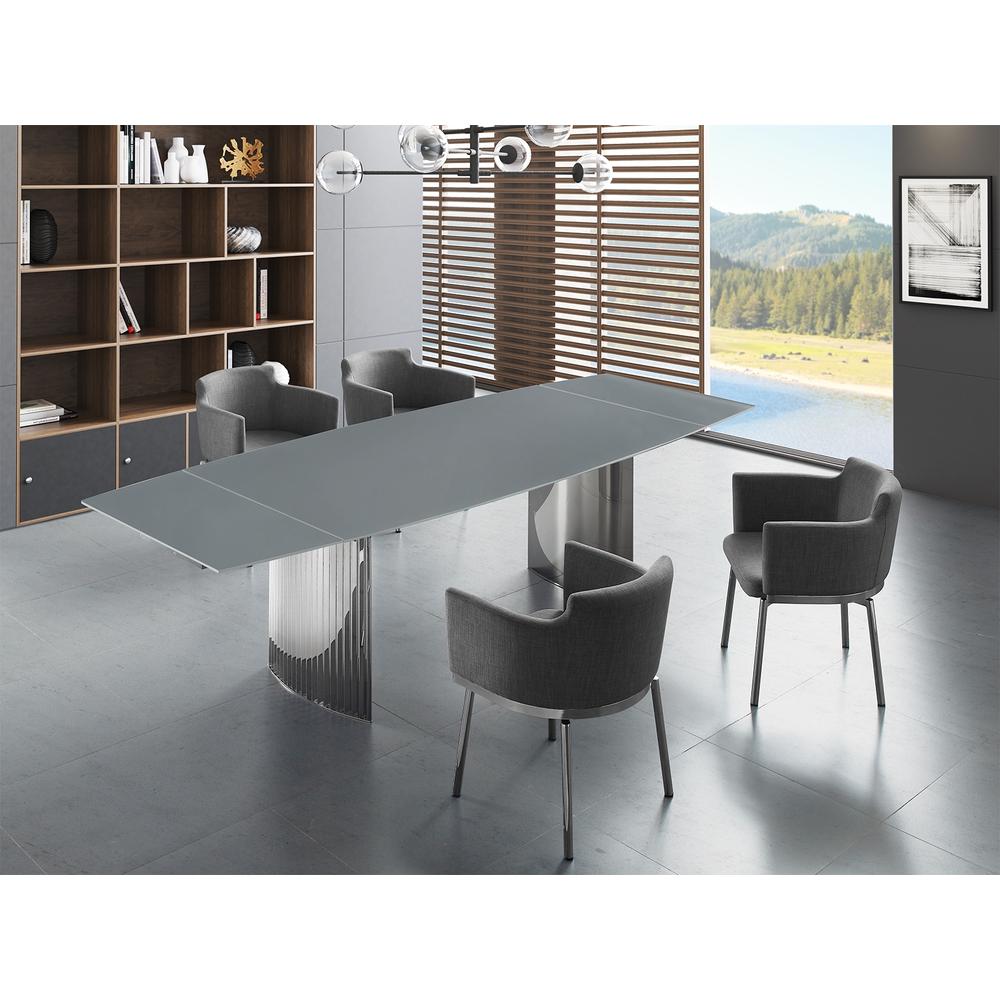 Allegra manual dining table with stainless steel base and gray top.. Picture 1