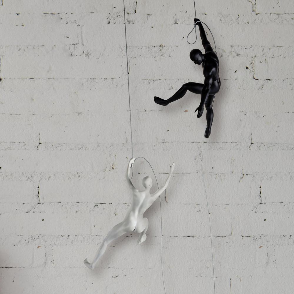 Climbing Couple Wall Sculpture Matte Black and White Resin Handmade. Picture 2