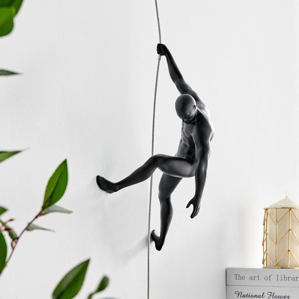 Climbing Couple Wall Sculpture Matte Black and White Resin Handmade. Picture 3