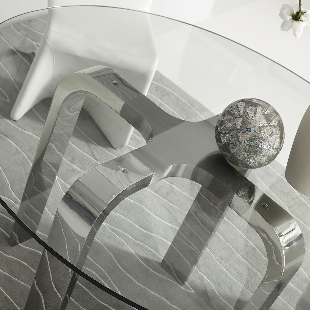 Designer Louis Lara's Cirrus table is Combination of brushed and polish stainless steel with 15mm Tempered glasstop Smoke. Picture 3