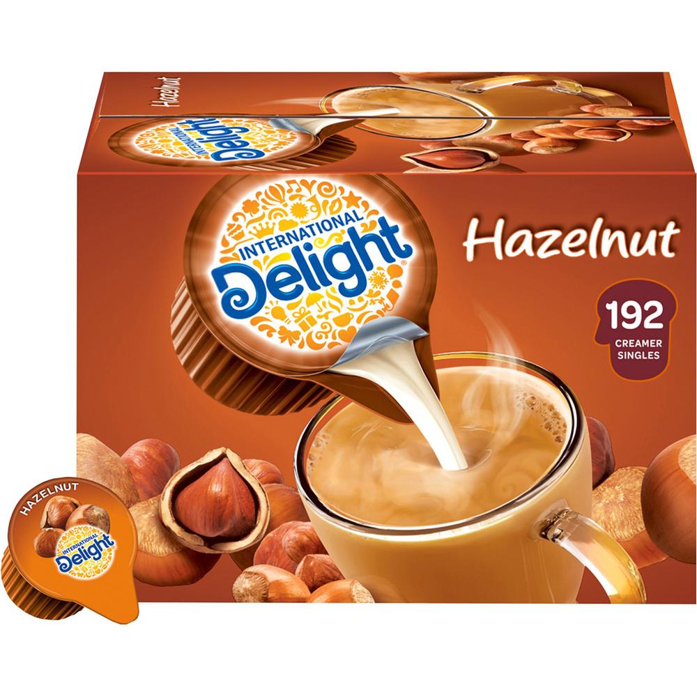 International Delight Hazelnut Liquid Creamer Singles - Hazelnut Flavor - 0.50 fl oz (15 mL) - 192/Carton. Picture 1