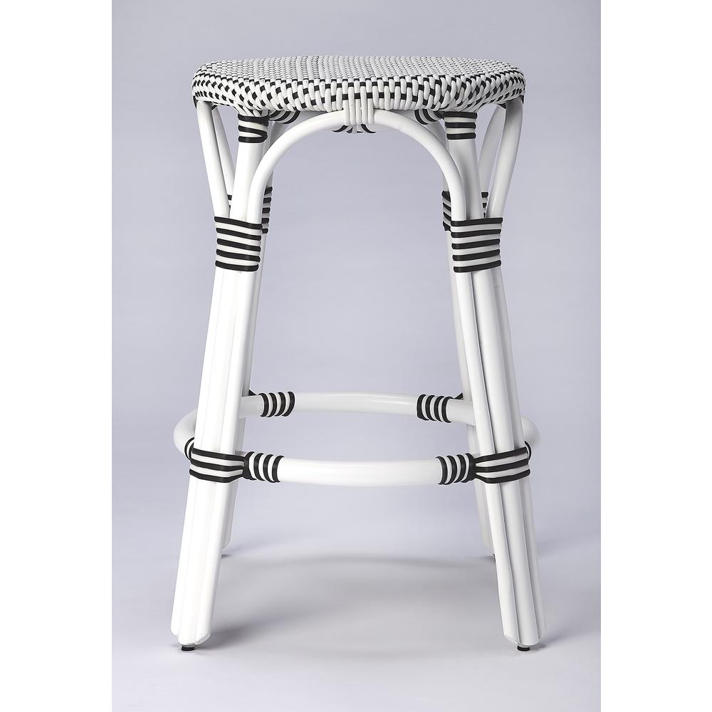 Company Tobias Rattan Round 24" Counter Stool, White and Black Dot. Picture 3