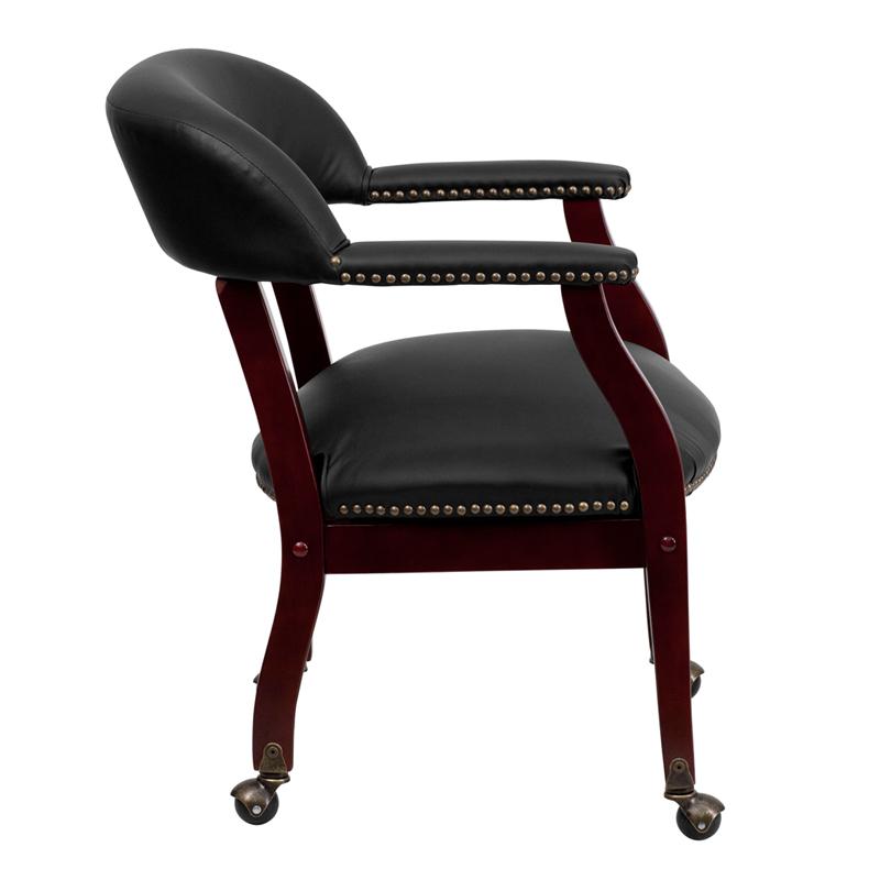 Black LeatherSoft Conference Chair with Accent Nail Trim and Casters. Picture 2