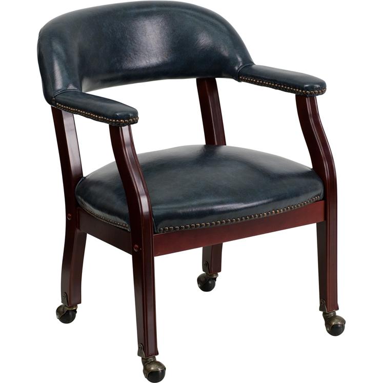 Navy Vinyl Luxurious Conference Chair with Accent Nail Trim and Casters. Picture 1