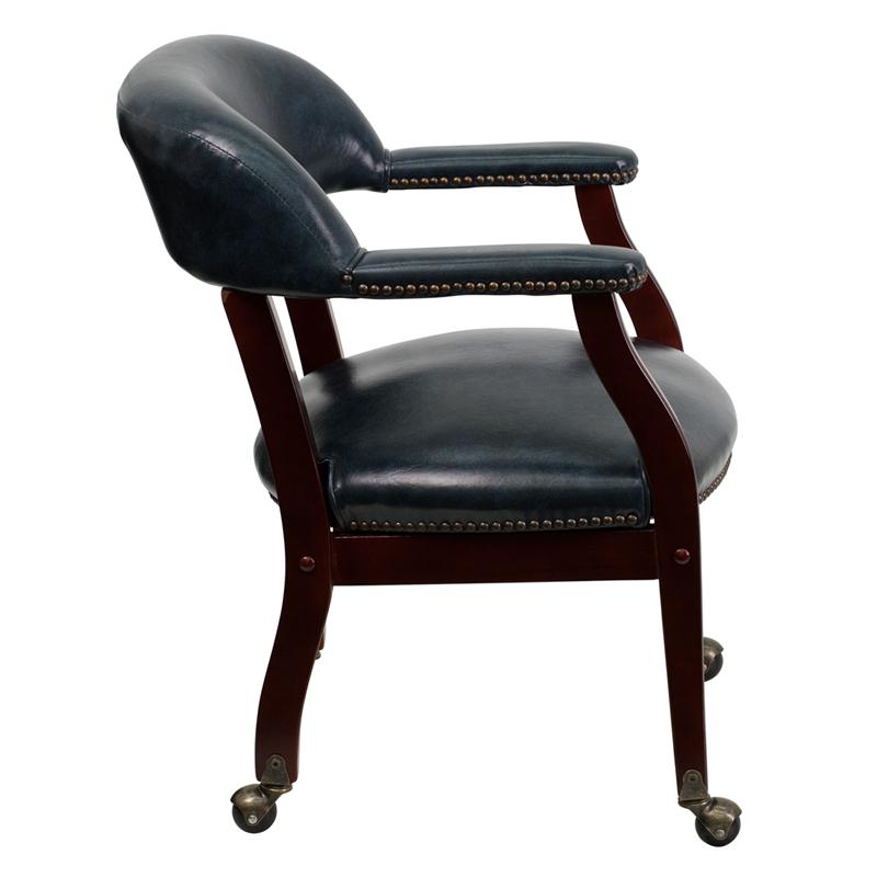 Navy Vinyl Luxurious Conference Chair with Accent Nail Trim and Casters. Picture 2