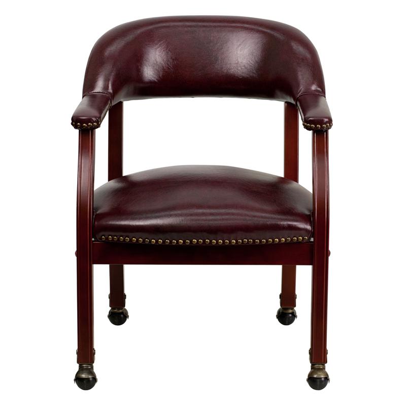Oxblood Vinyl Luxurious Conference Chair with Accent Nail Trim and Casters. Picture 4