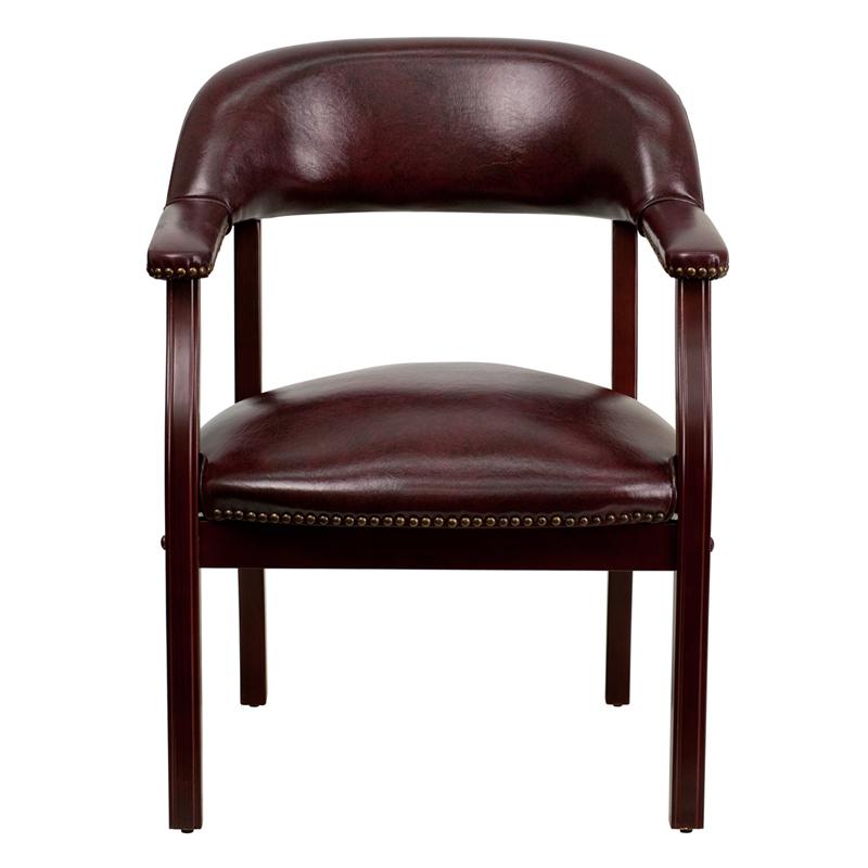 Oxblood Vinyl Luxurious Conference Chair with Accent Nail Trim. Picture 4